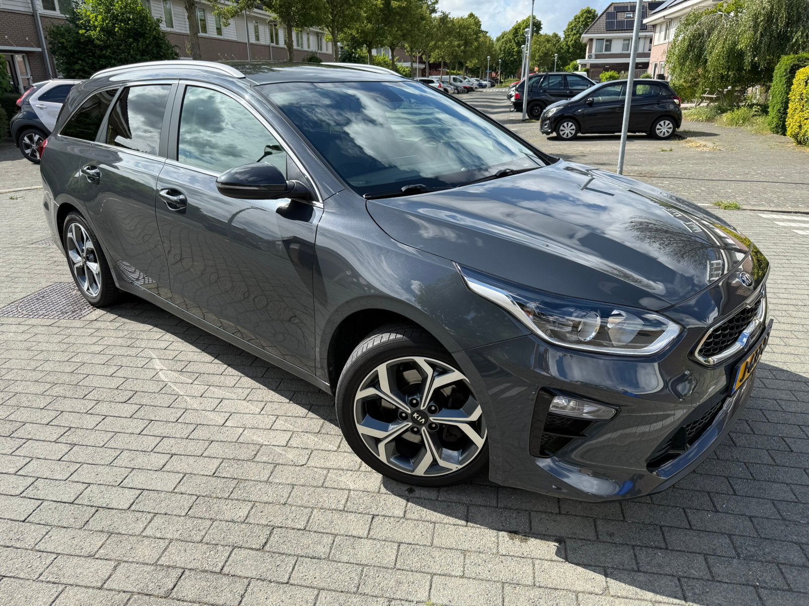 Kia Ceed 1.4 T-gdi 140pk Dct7 2020 Grijs, Auto's, Kia, 4 cilinders, Leder en Stof, Origineel Nederlands, Stationwagon