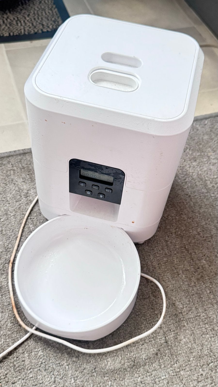 Automatische voerbak voor hond of kat, Ophalen