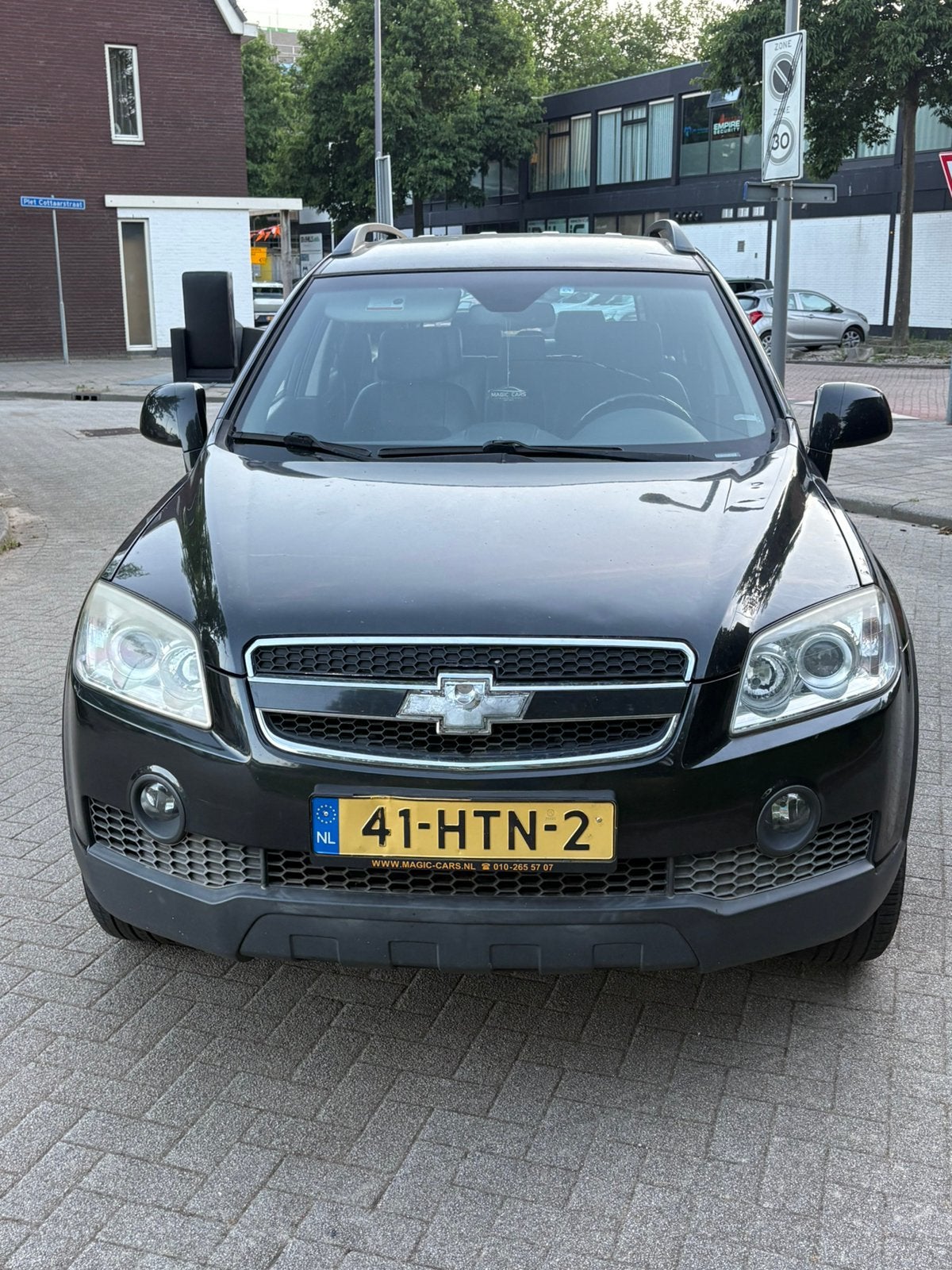 Chevrolet Captiva 2.4 4WD 2009 Zwart, Auto's, Chevrolet, 136 pk, 4 cilinders, 7 stoelen, Zwart