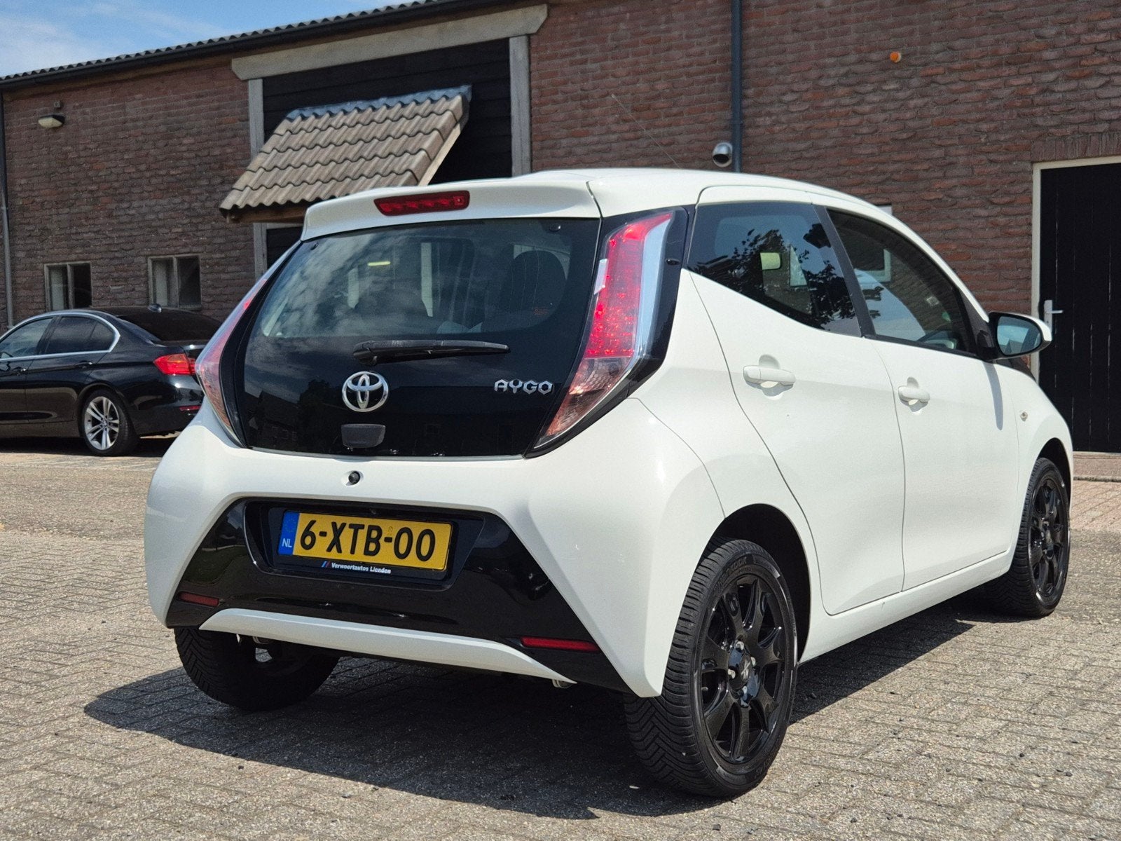 Toyota Aygo 1.0 12V Vvt-i Ddrs 2015 Wit I Airco I Camera I C, Auto's, Toyota, Voorwielaandrijving, Stof, Euro 6, Met garantie (alle)