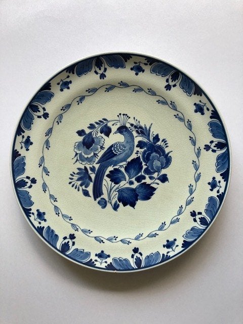 Delfts Blauw wandbord met paradijsvogel, uit 1926., Antiek en Kunst, Ophalen