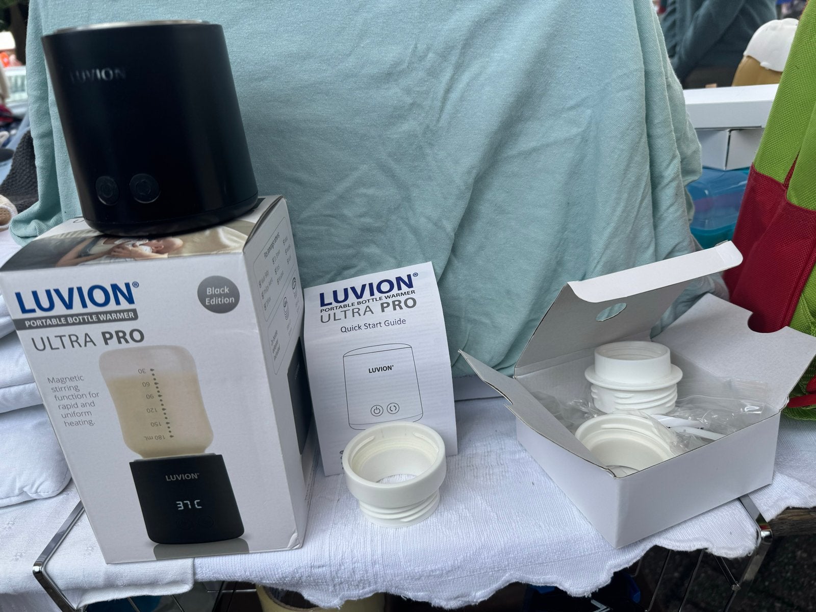 Luvion Ultra Pro Draagbare Flessenwarmer - Black Edition, Kinderen en Baby's, Babyvoeding en Toebehoren, Ophalen, Gebruikt, Flessen- of potjesverwarmer