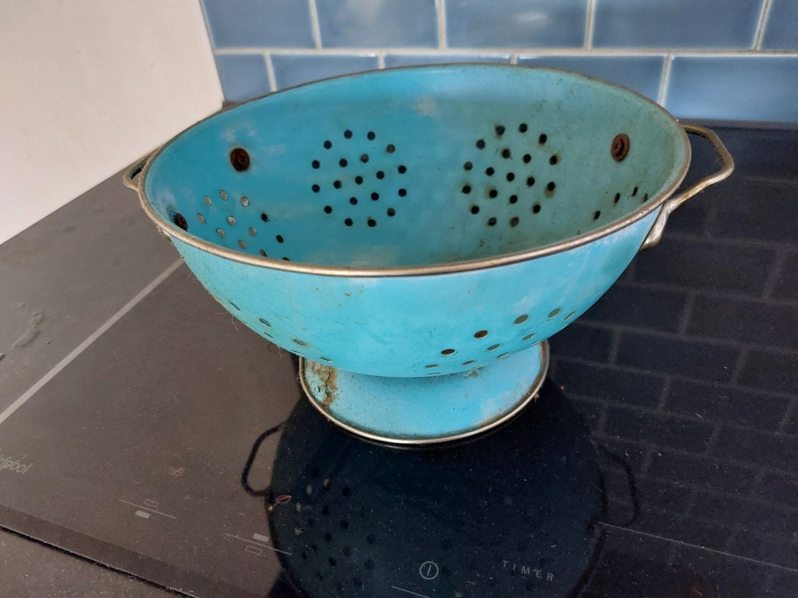 oud vergiet en pannetje, Ophalen