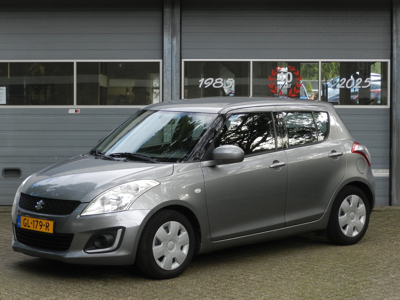 Suzuki Swift 1.2 5Drs Comfort EASSS Airco Isofix Metallic la, Auto's, Stof, Gebruikt, 4 cilinders, 400 kg