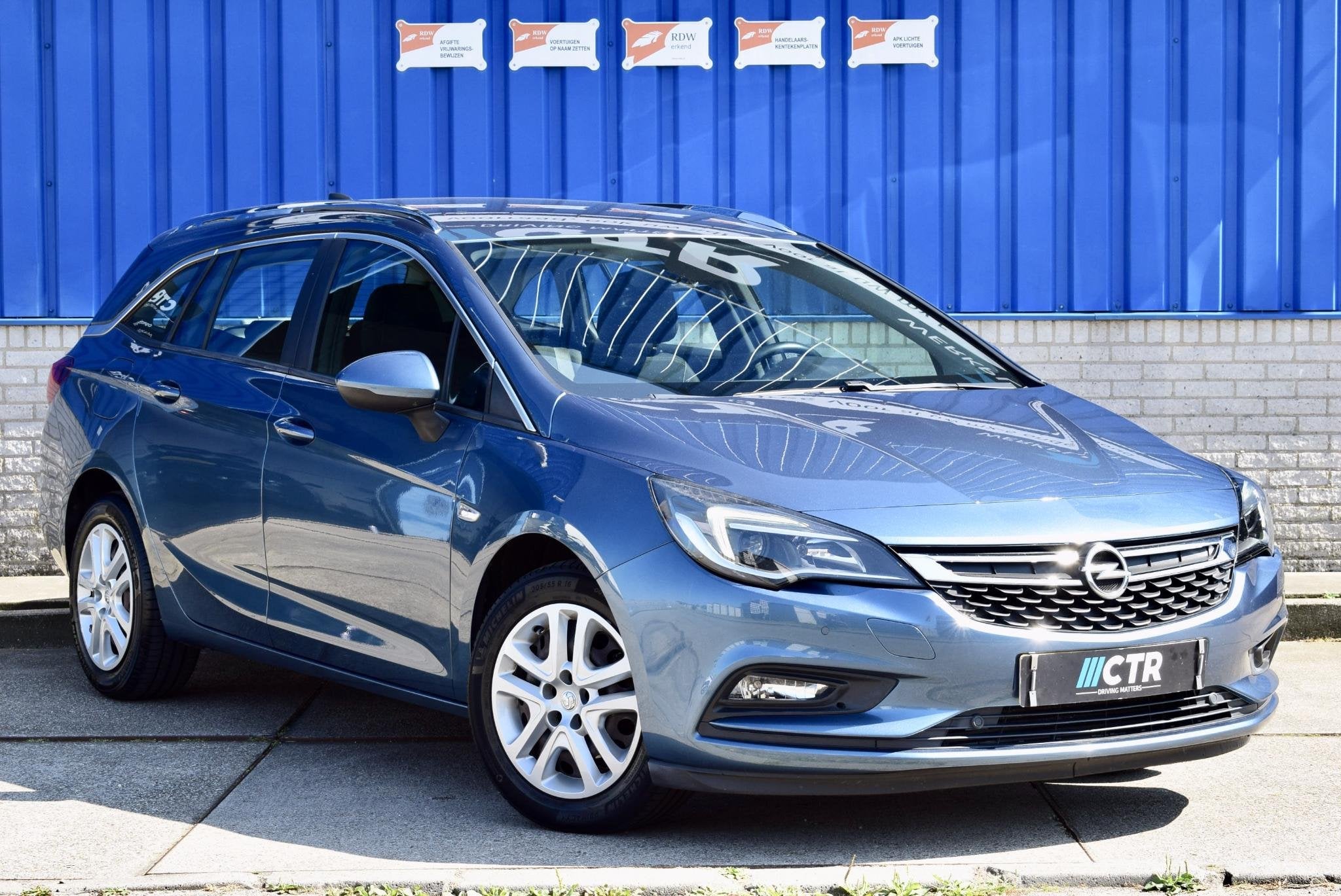 Opel Astra Sports Tourer 1.4 Edition, Auto's, Opel, Voorwielaandrijving, Stof, Gebruikt, 4 cilinders