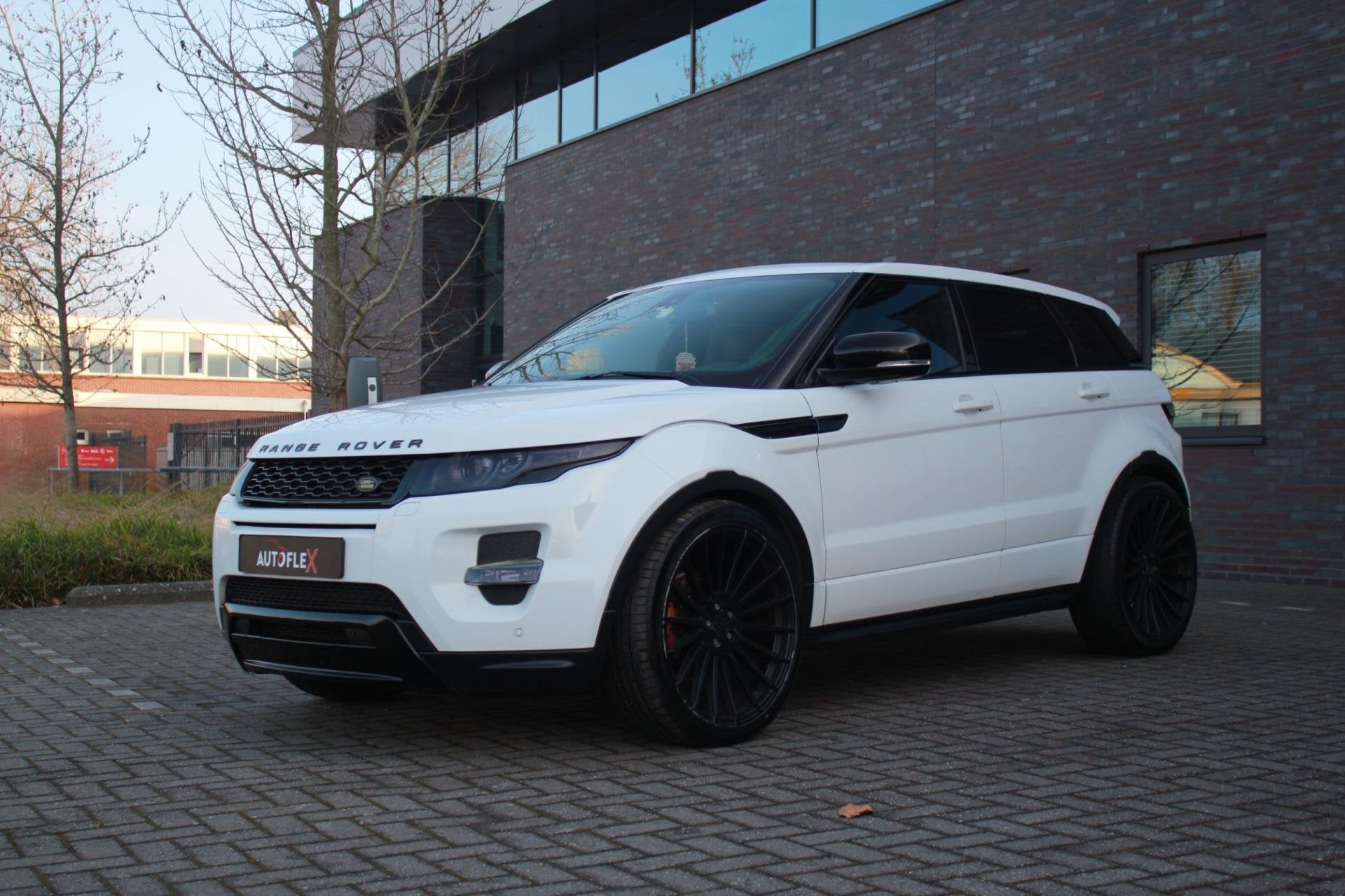 Land Rover Range Rover Evoque 2.0 Si 4WD Prestige, Auto's, Land Rover, Automaat, Euro 5, 4 cilinders, Wit