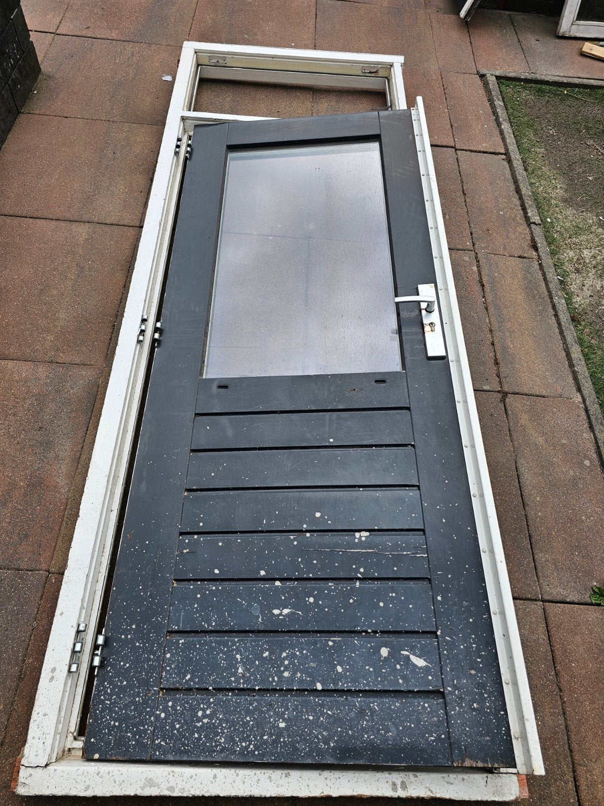 Zwarte buitendeur met kozijn en dubbel glas, Ophalen, Gebruikt, 80 tot 100 cm, Buitendeur