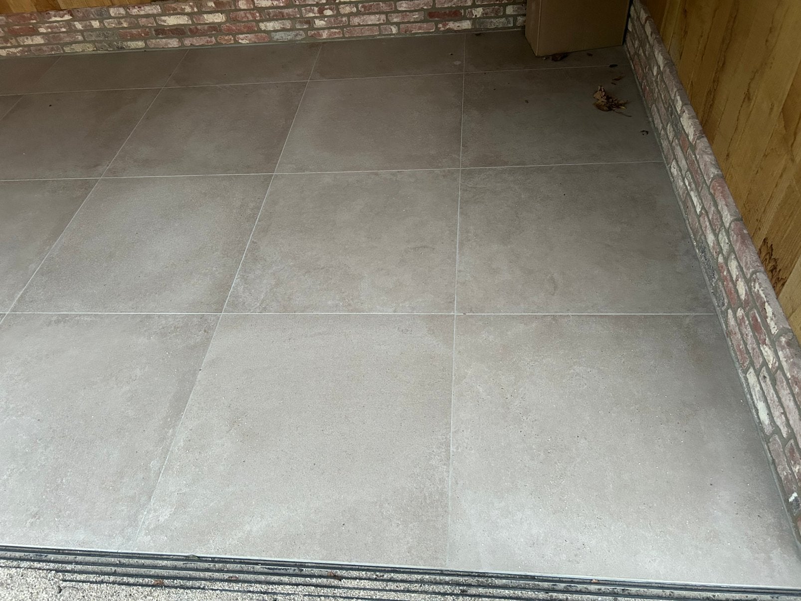 7,04 m2 taupe kleurige vloertegels, Ophalen, 60 cm of meer, Nieuw, 5 tot 10 m²