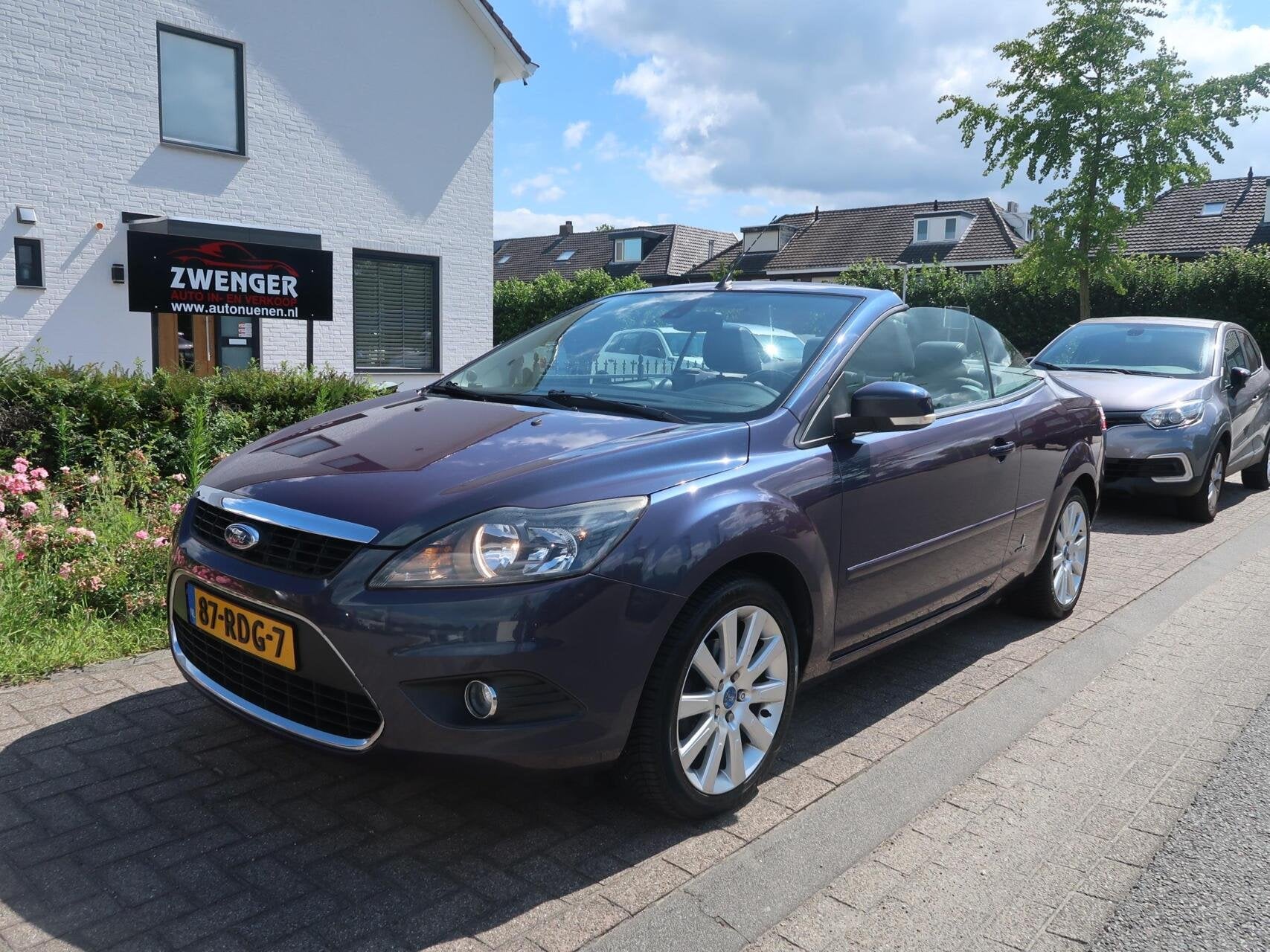 Ford Focus Cabriolet 1.6 NAVIGATIE|CARPLAY|LEDER|CRUISECONTR, Auto's, Ford, Gebruikt, Zwart, 4 cilinders, Cabriolet