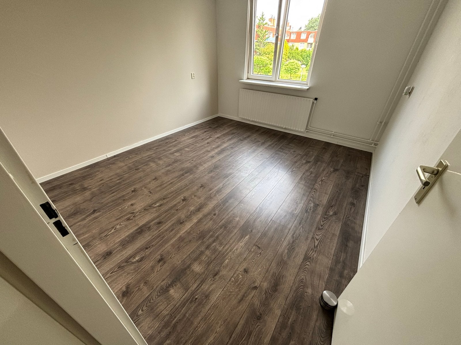 Laminaatvloer - Donker hout, Ophalen, 50 tot 150 cm, Zo goed als nieuw, 10 m² of meer