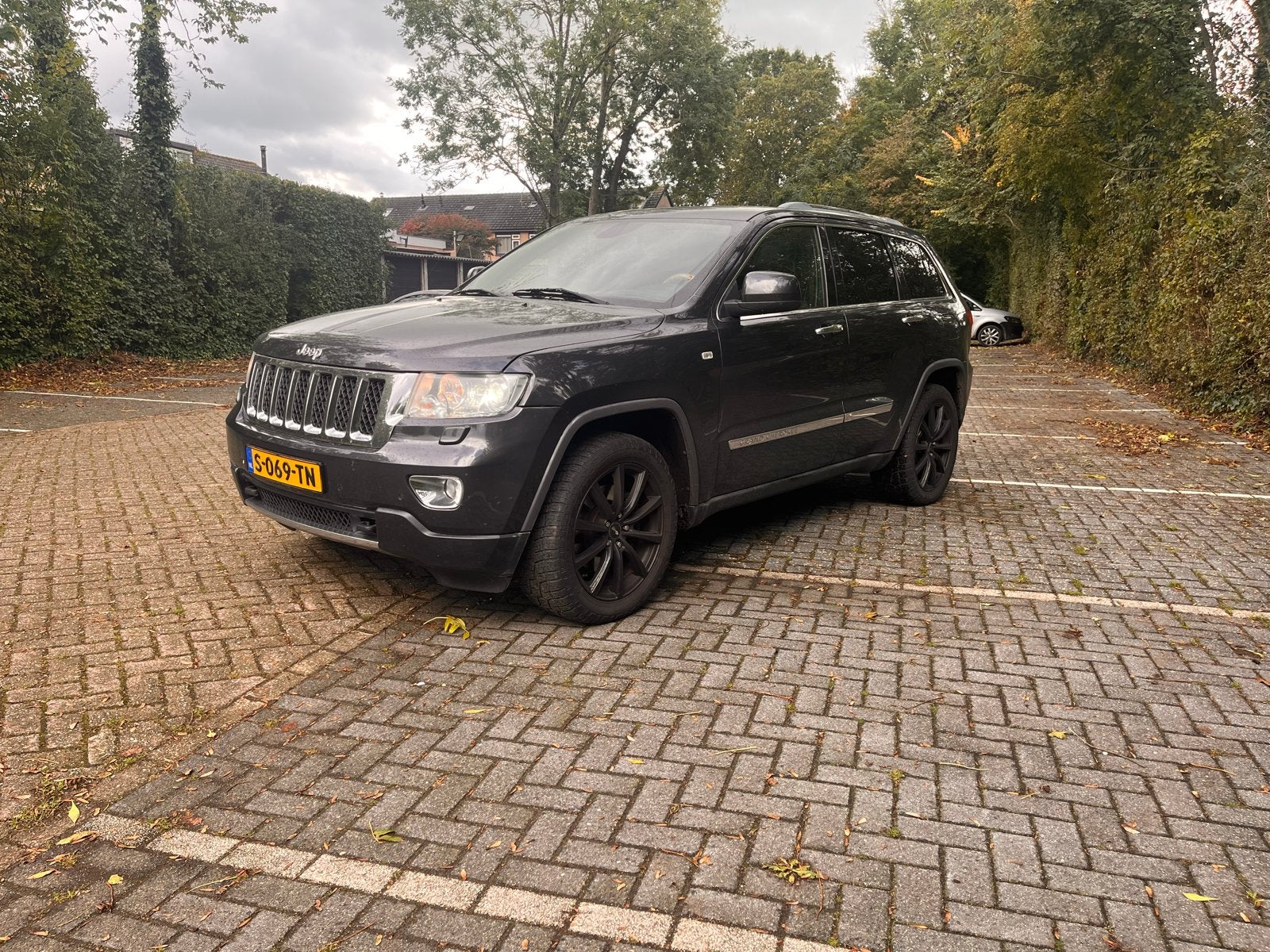 Jeep Grand Cherokee 3.6 V6 AWD AUT 2010 Grijs, Auto's, Automaat, 2268 kg, 286 pk, Vierwielaandrijving
