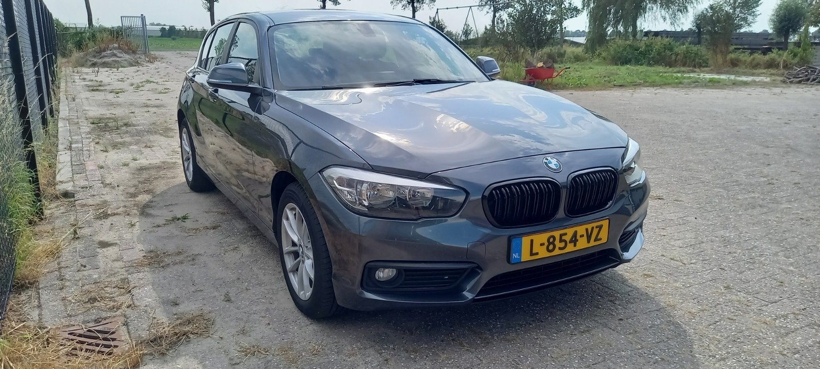 BMW 1-Serie 116i 109pk 2016 Grijs nieuw apk, Auto's, 1-Serie, Achterwielaandrijving, 1280 kg, Airbags