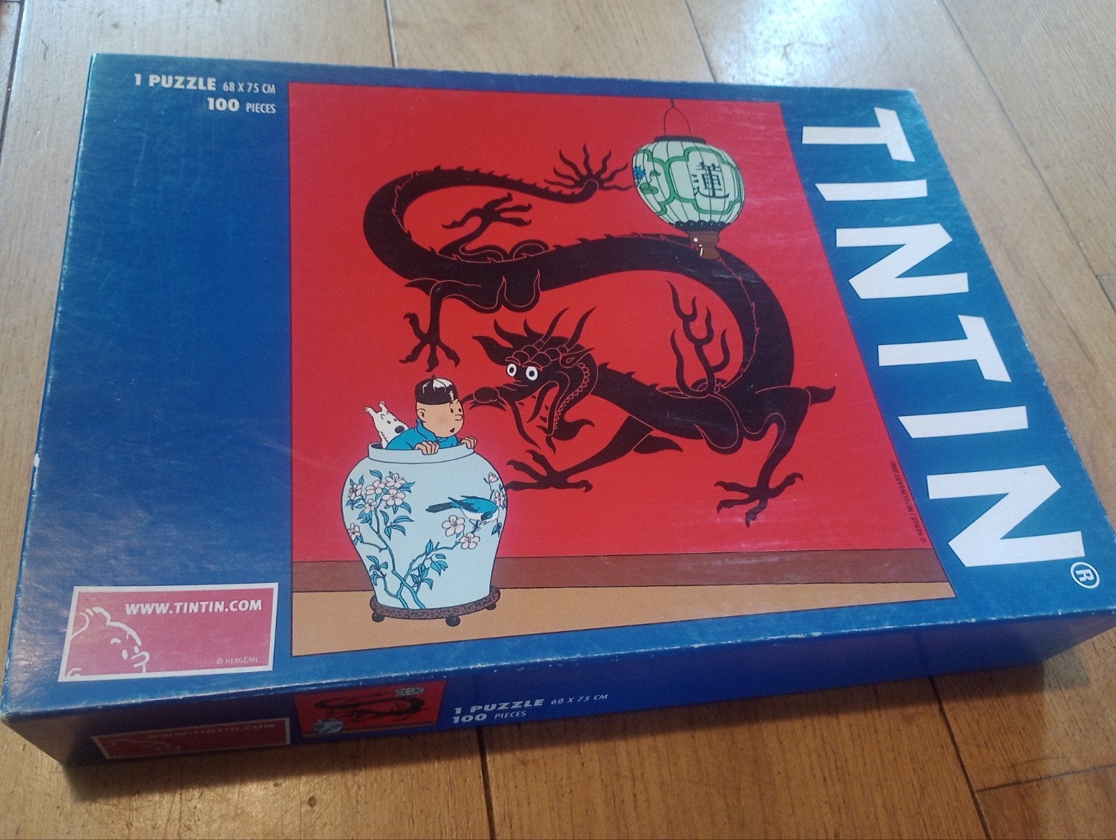 Tintin Puzzel - De Blauwe Lotus - 100 stukjes, Een of twee spelers, Ophalen of Verzenden, Gebruikt