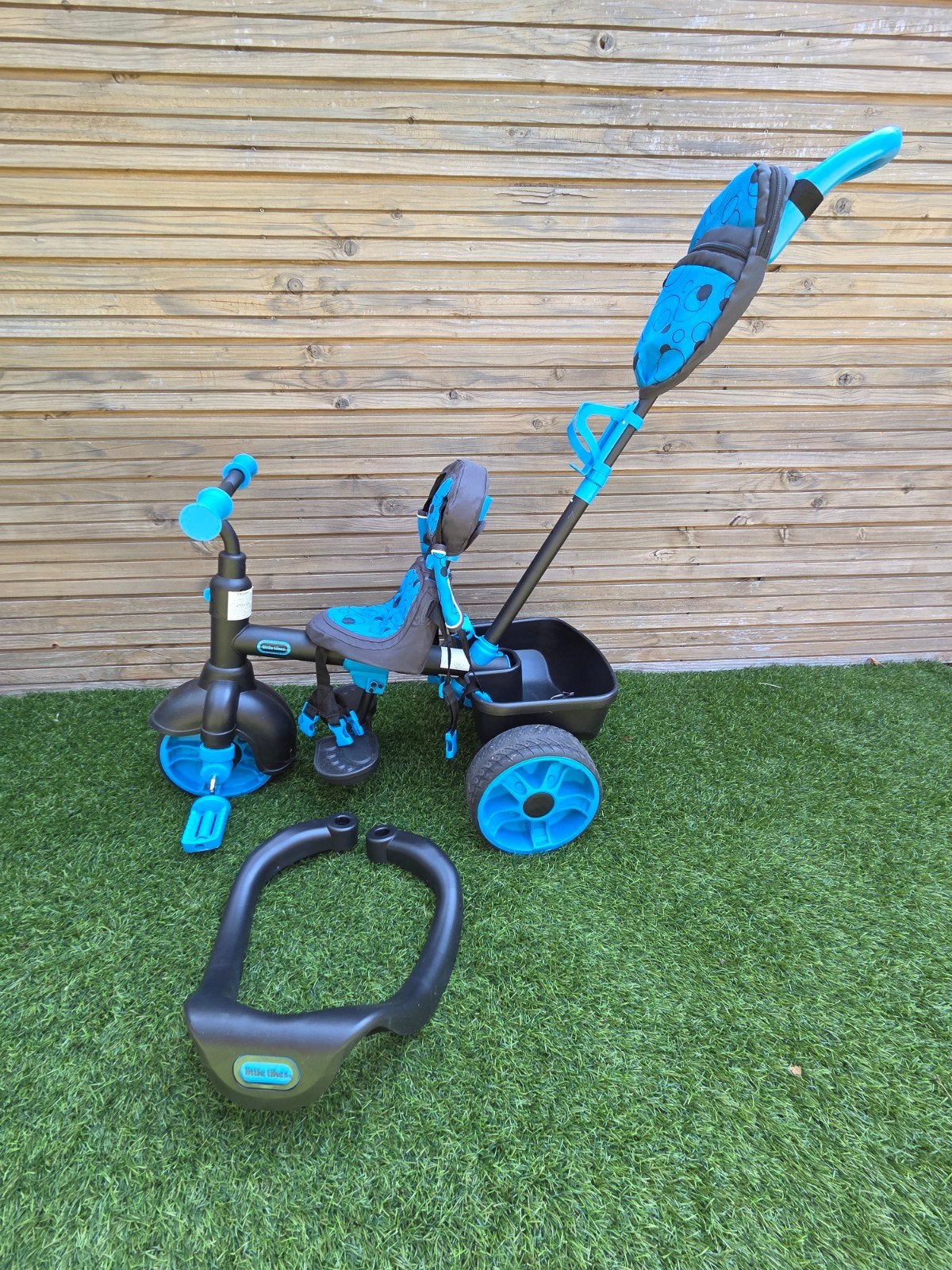 Driewieler met duwstang Little tikes, Ophalen