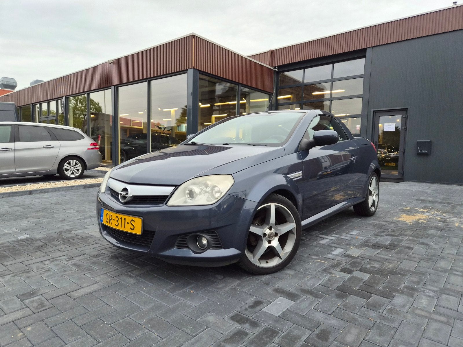 Opel Tigra 1.4 16V Twintop AUT 2005 Blauw Cabrio, 4 cilinders, Cabriolet, Blauw, 49 €/maand