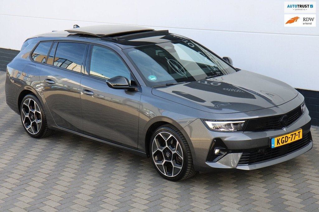 Opel Astra Sports Tourer 1.6 Turbo GS PHEV Pano HUD BTW !, Auto's, Opel, Gebruikt, 4 cilinders, 179 pk, Leder en Stof