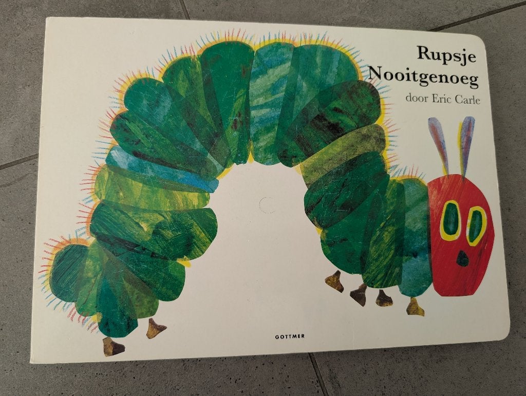Boek Rupsje Nooitgenoeg - Eric Carle, Ophalen of Verzenden, Gelezen, Eric Carle, Prentenboek