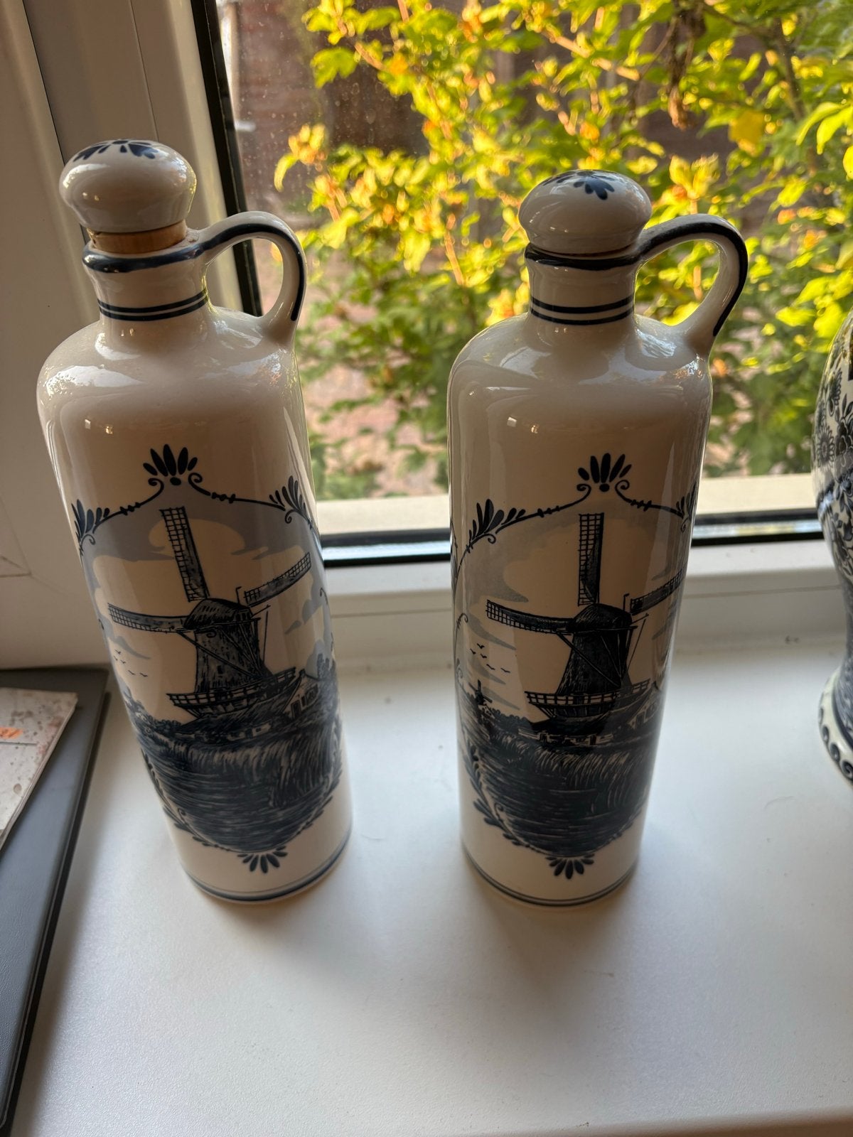 Set van 2 antieke Bols Delft Blue jeneverkruiken, Ophalen
