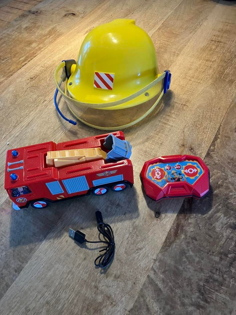 Brandweerman sam helm+bestuurbare auto, Ophalen of Verzenden, Zo goed als nieuw