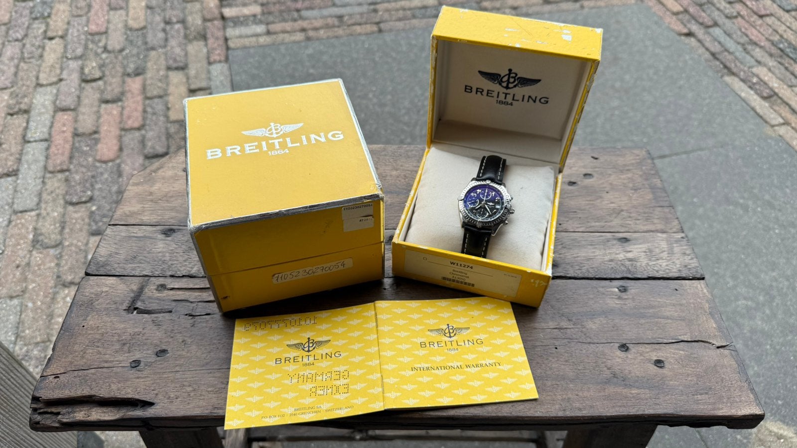 Breitling Chronomat Blackbird met doos en papieren, Leer, Staal, Breitling, Polshorloge
