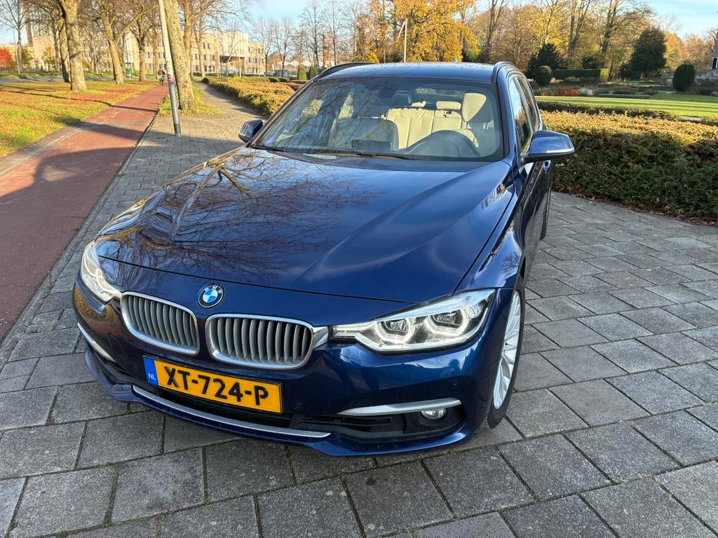 Hele mooie BMW 320i touring 184pk Aut 2019 Blauw. Weing km., Auto's, 1998 cc, Achterwielaandrijving, 1800 kg, 4 cilinders