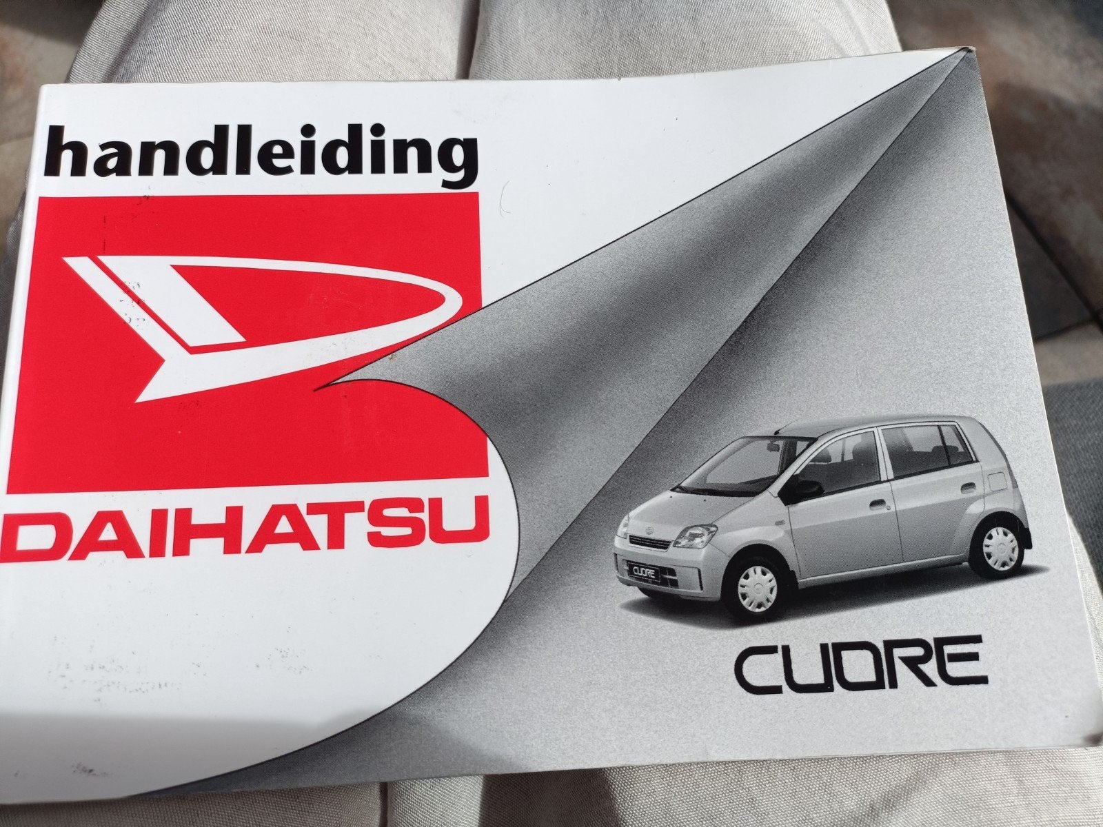 handleiding Daihatsu Cuore - nieuwstaat, Ophalen of Verzenden