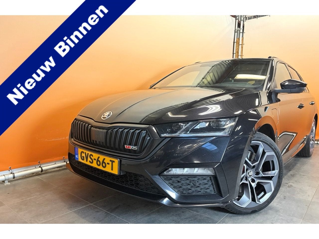 Skoda Octavia Combi 1.4 TSI RS iV PHEV Business panodak | st, Stof, 4 cilinders, Met garantie (alle), Zwart