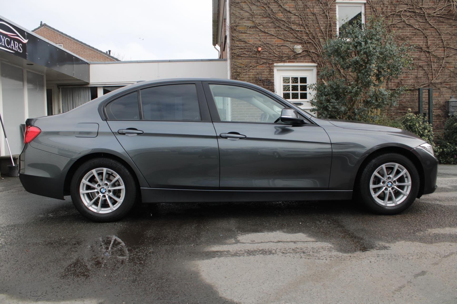 Foto 8 van BMW 3-serie 316i High Executive | Airco | Navi |Elec ramen |