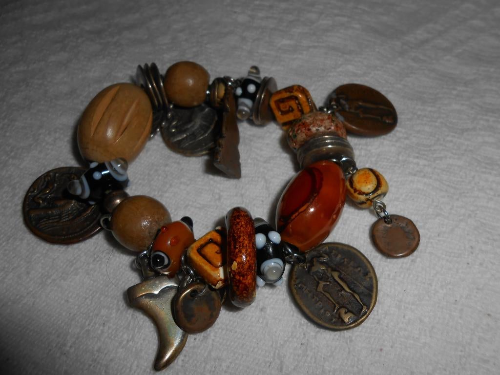 Mooie armband van SARI (meer sieraden van Sari te koop), Ophalen of Verzenden, Zo goed als nieuw, Bruin, Overige materialen