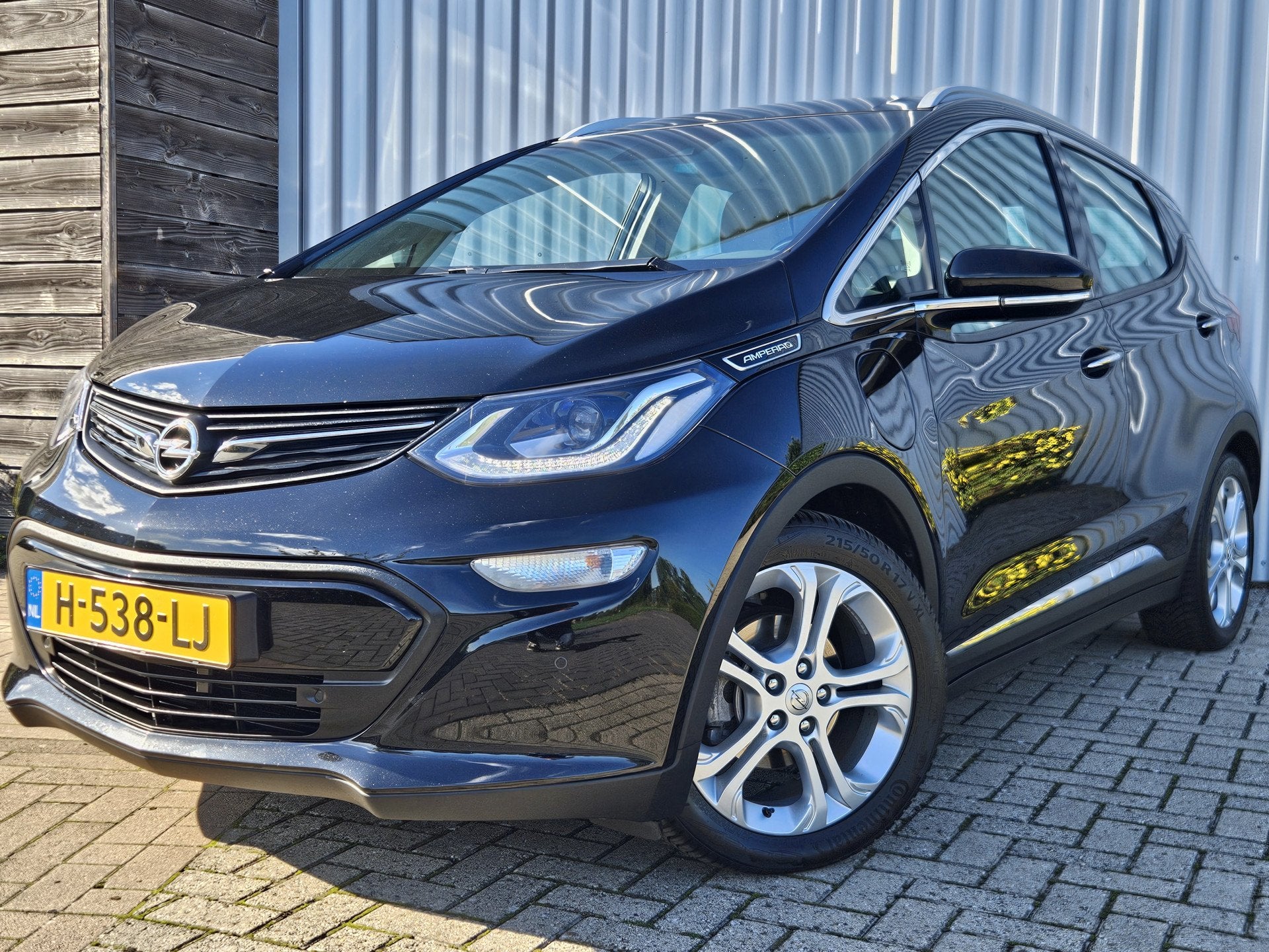 Opel Ampera-E Business Executive 60 kWh / Nieuw Accupakket!, Auto's, Opel, Stof, Gebruikt, Zwart, Origineel Nederlands