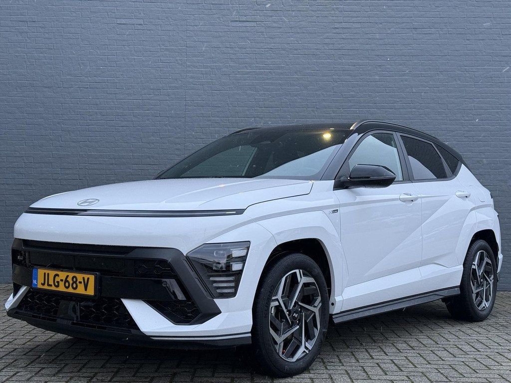 Hyundai Kona 1.6 GDI HEV 141pk DCT N-Line Edition | N-Line S, Auto's, Hyundai, Stof, Gebruikt, 2 kWh, Wit