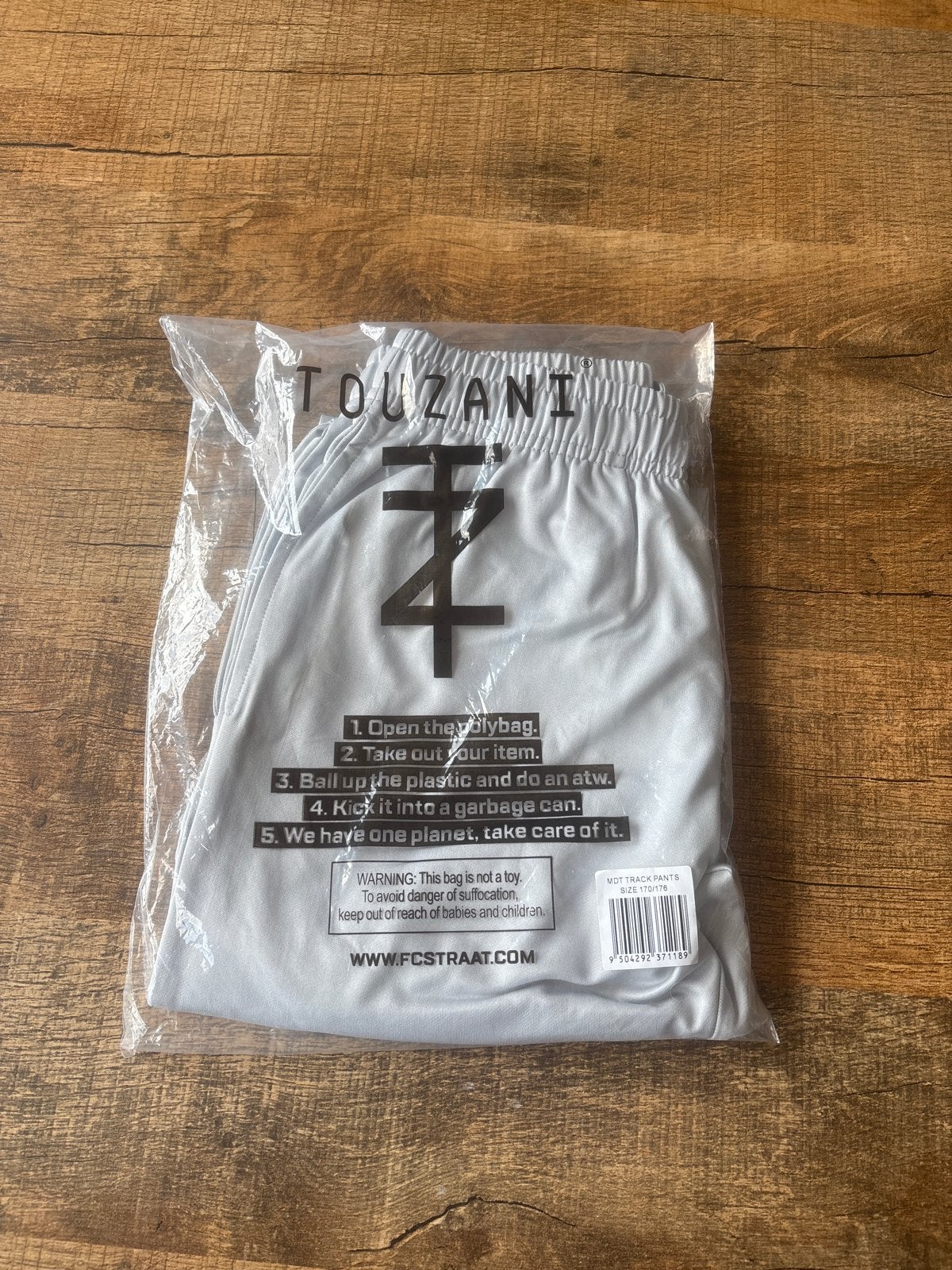 Nieuw Touzani trainingspak maat 170/176, Ophalen, Nieuw, Overige maten, Grijs