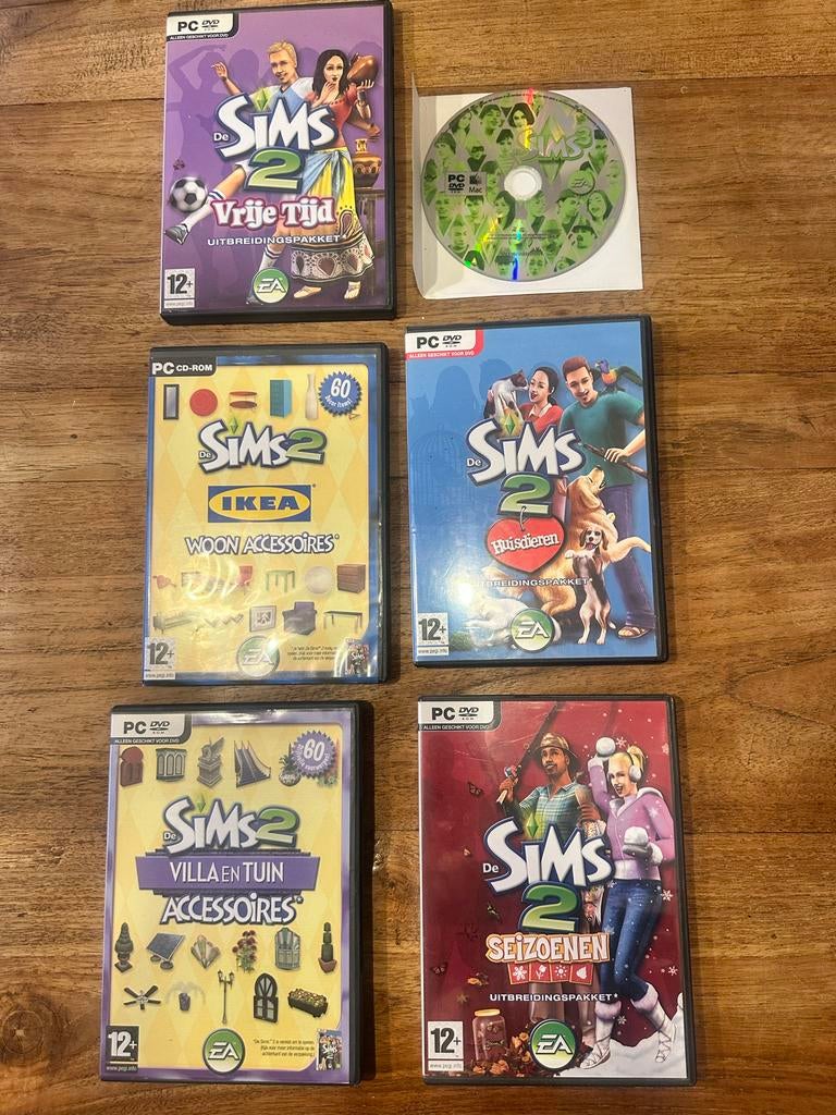 De Sims 2 Uitbreidingspakketten en Accessoires (5 stuks), Spelcomputers en Games, Games | Pc, Ophalen, Gebruikt, 1 speler, Vanaf 12 jaar