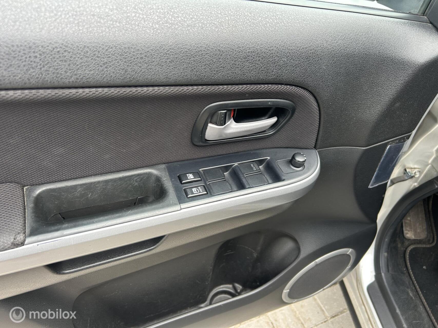 Foto 13 van Suzuki Grand Vitara 2.0-16V Exclusive