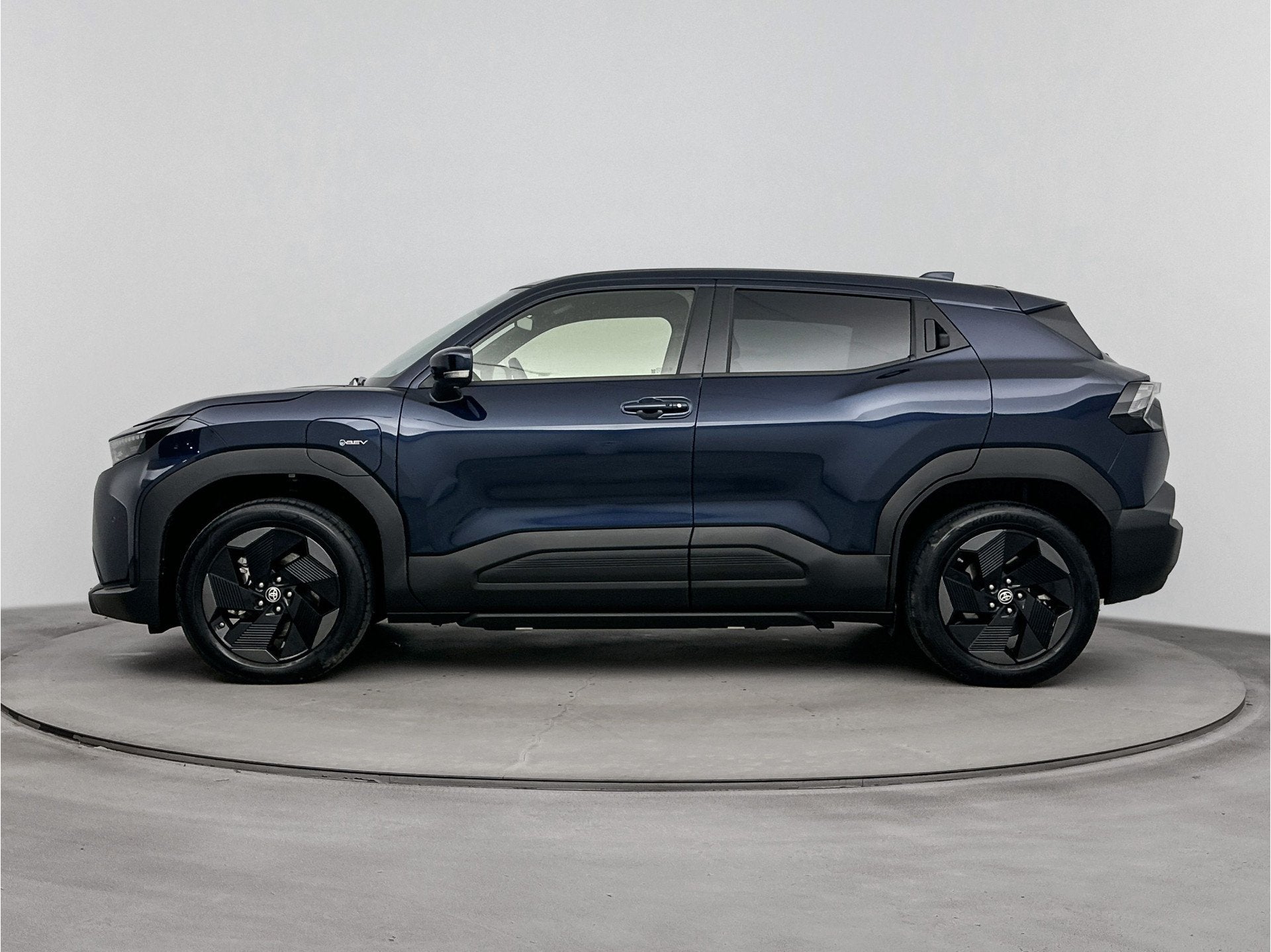 Toyota Urban Cruiser Dynamic 61 kWh (bj 2026, automaat), Auto's, 12 maanden, Stof, Gebruikt, Blauw