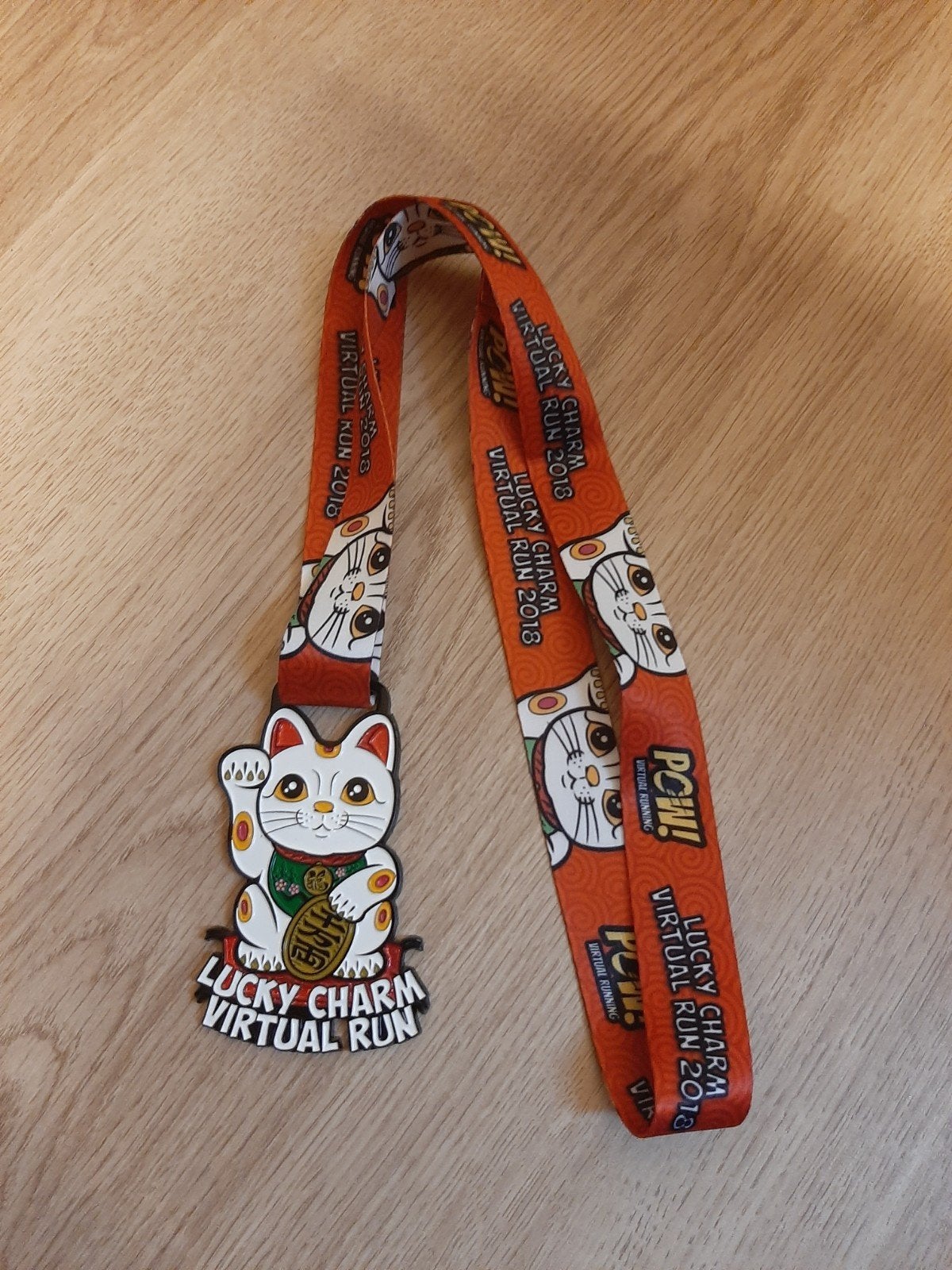 Lucky cat wandel medaille pow! virtual running, Postzegels en Munten, Penningen en Medailles, Ophalen of Verzenden
