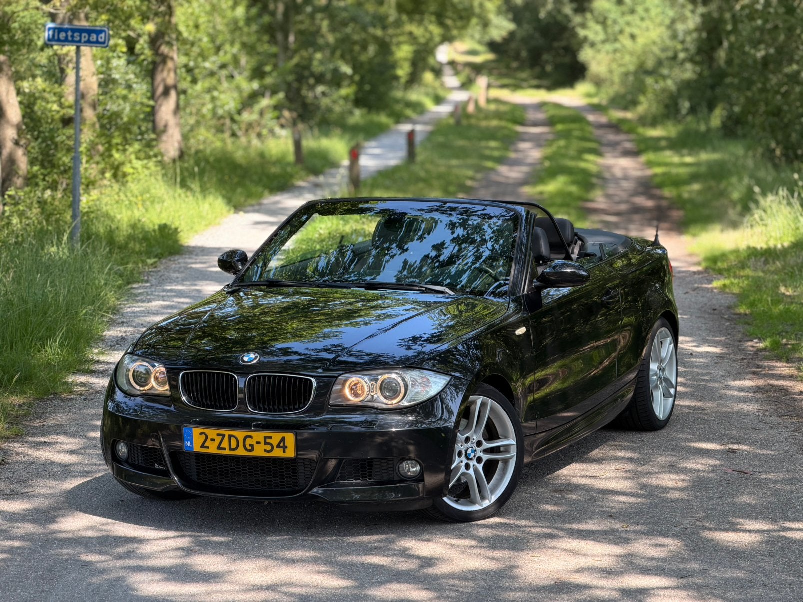 BMW 1-Serie 3.0 125I LCI Cabrio 2009 Zwart M-Sport, Auto's, 1-Serie, Achterwielaandrijving, Zwart, Handgeschakeld