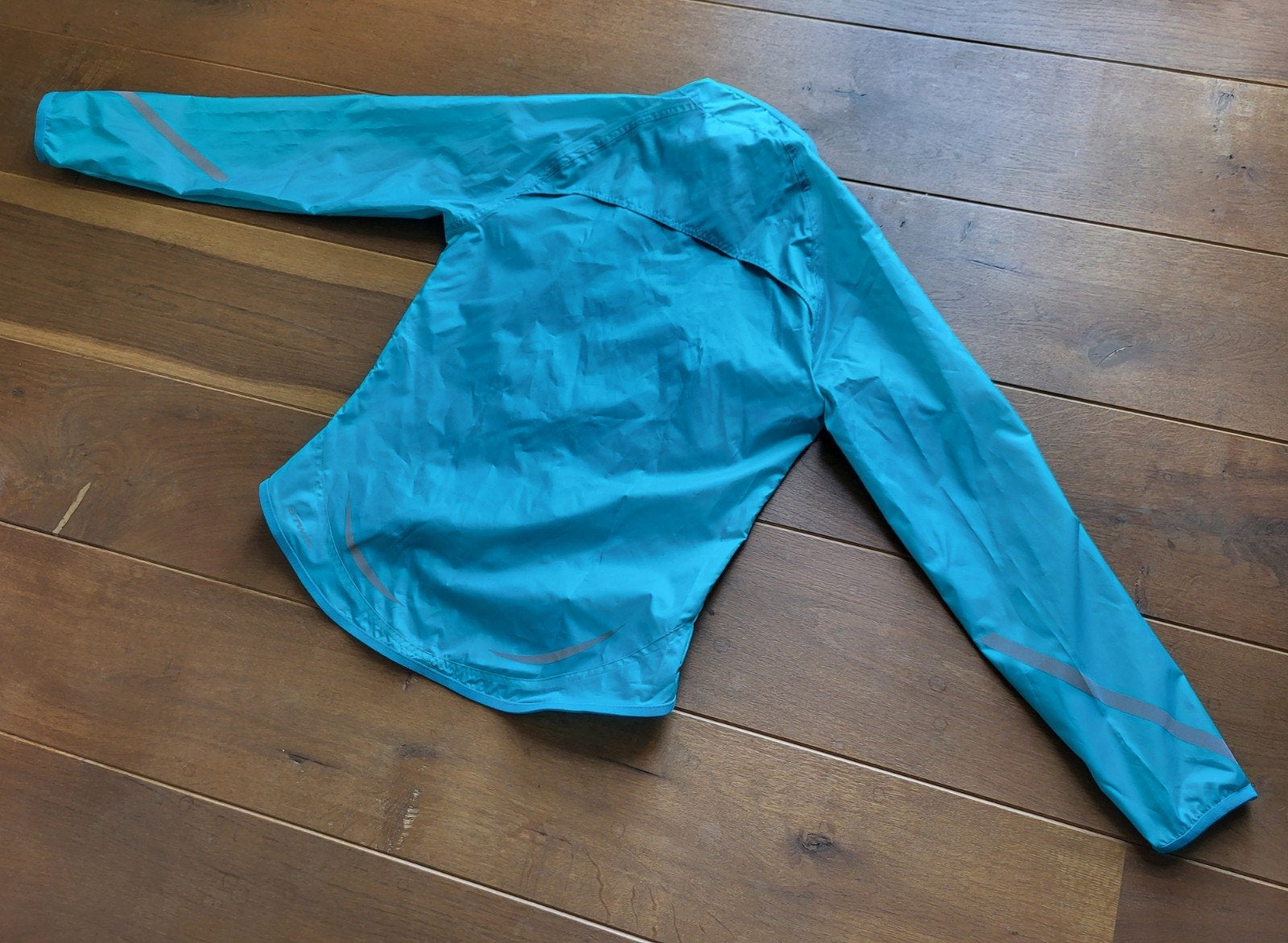B'twin dunne regenjas voor de wielrenner mt 40, Ophalen of Verzenden
