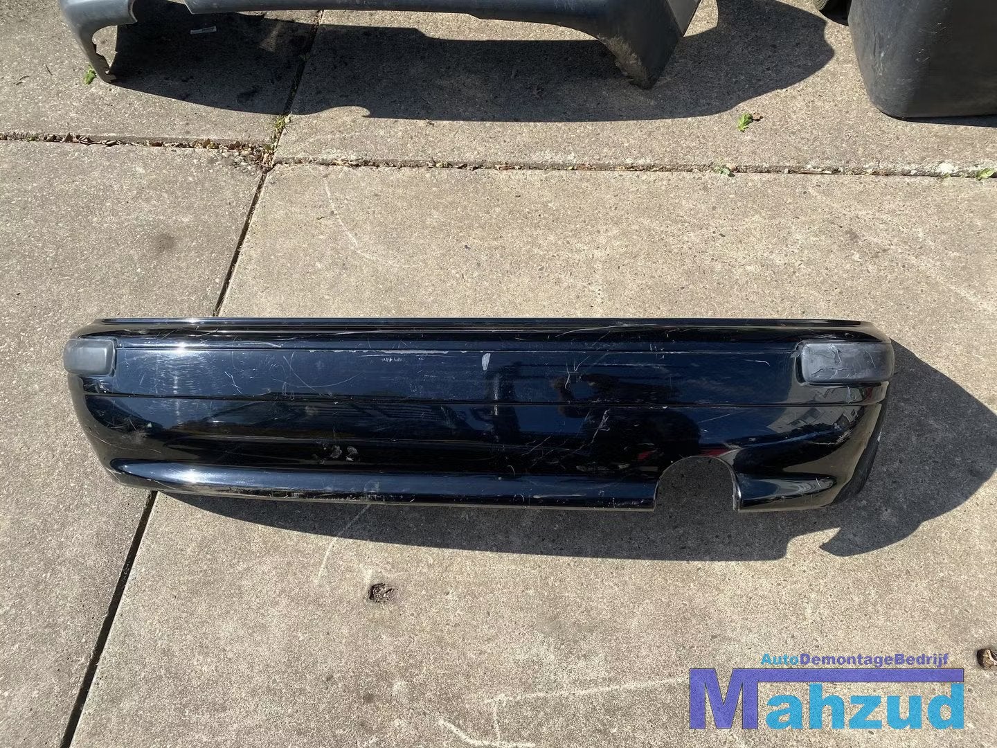NISSAN MICRA 2 K11 Zwart achterbumper 1992-2002, Takashima 1-chome 1-1
220-8686  Yokohama, Ophalen of Verzenden, Achter, Bumper