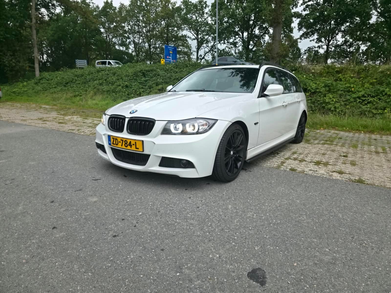 BMW 3-Serie 2.0 I 320 Touring 125KW 2009 Wit, Auto's, Achterwielaandrijving, 1995 cc, Zwart, 4 cilinders