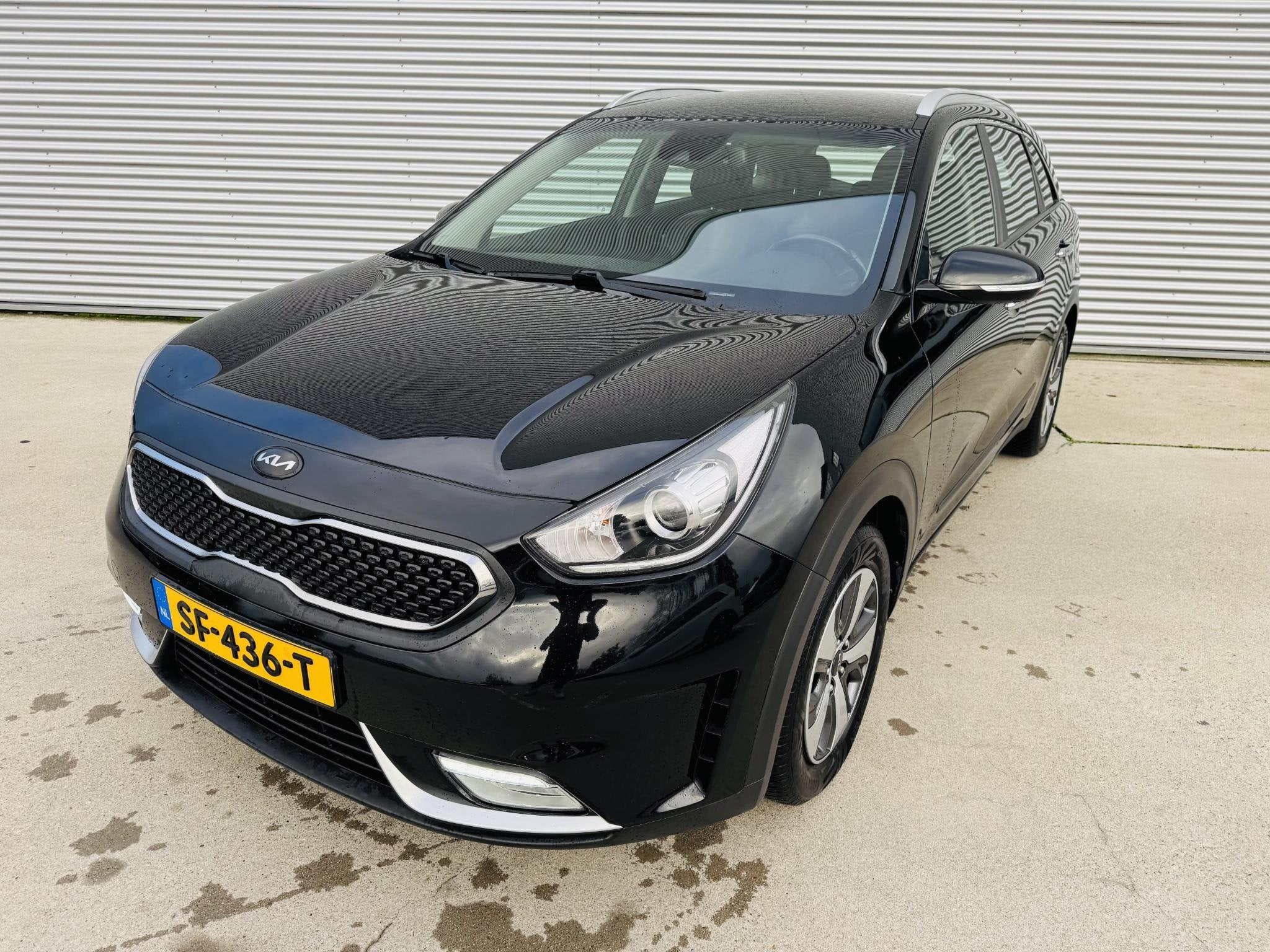 Kia Niro 1.6 GDi Hybrid DynamicLine Trekhaak | Clima | Cruis, Auto's, Gebruikt, Euro 6, Leder en Stof, Zwart
