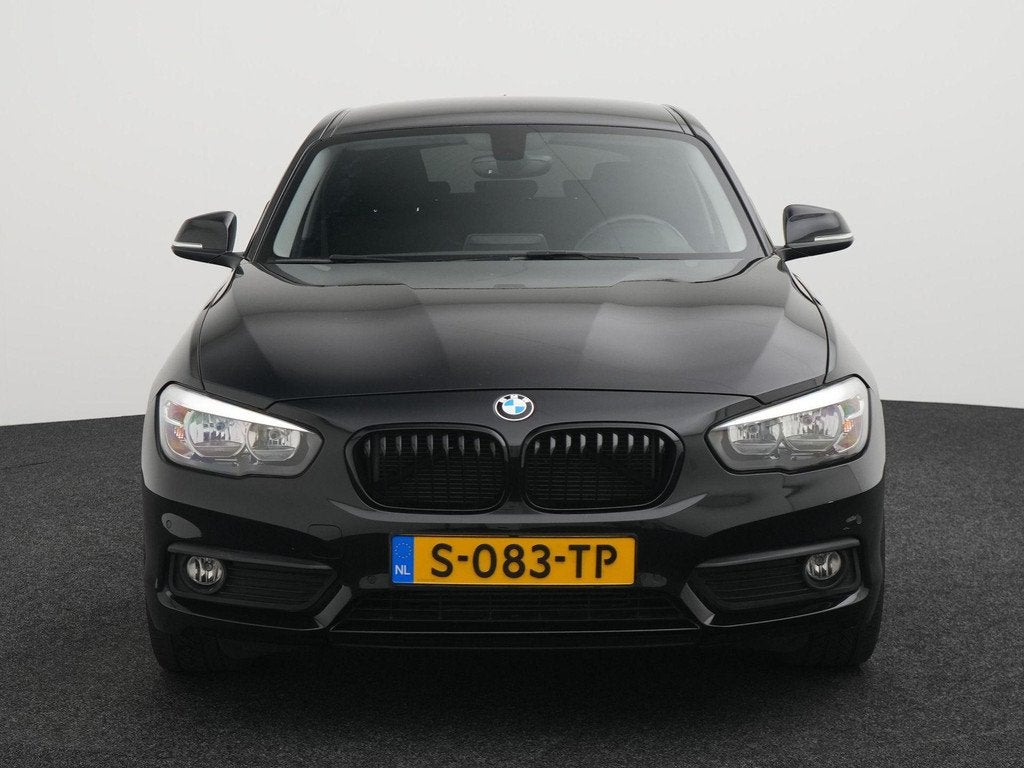 BMW 1-serie 116i Edition Sport Line Shadow, Auto's, 1-Serie, 12 maanden, Euro 6, Zwart