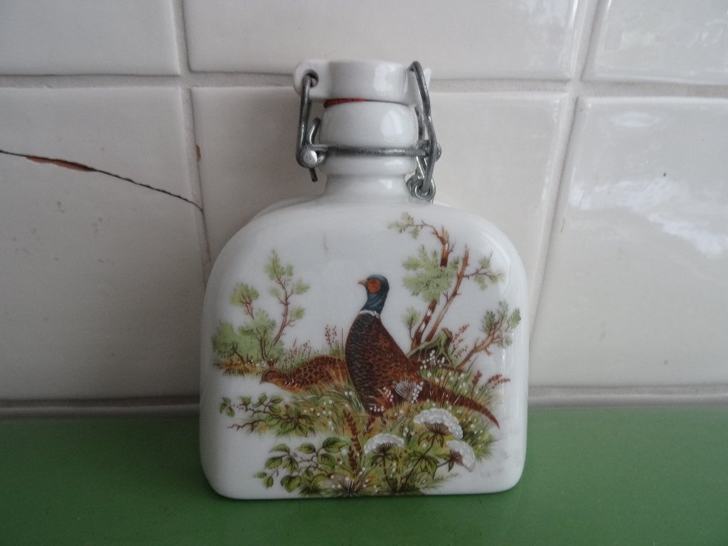 Oude vintage jachtfles met beugel porselein met fazant, Ophalen