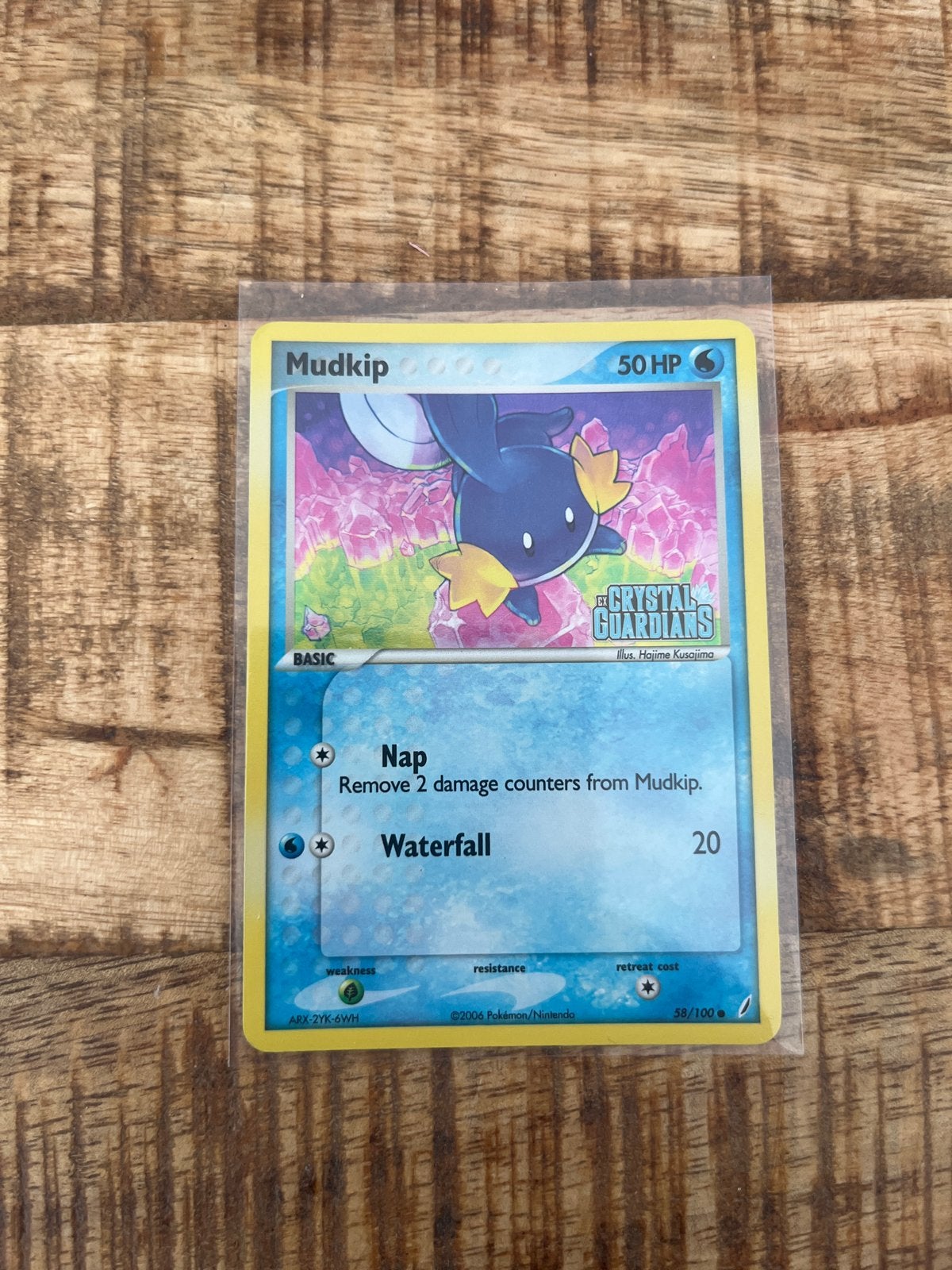 Mudkip 38/100 Reverse Foil Crystal Guardians Pokémon Kaart, Ophalen, Zo goed als nieuw, Losse kaart, Foil