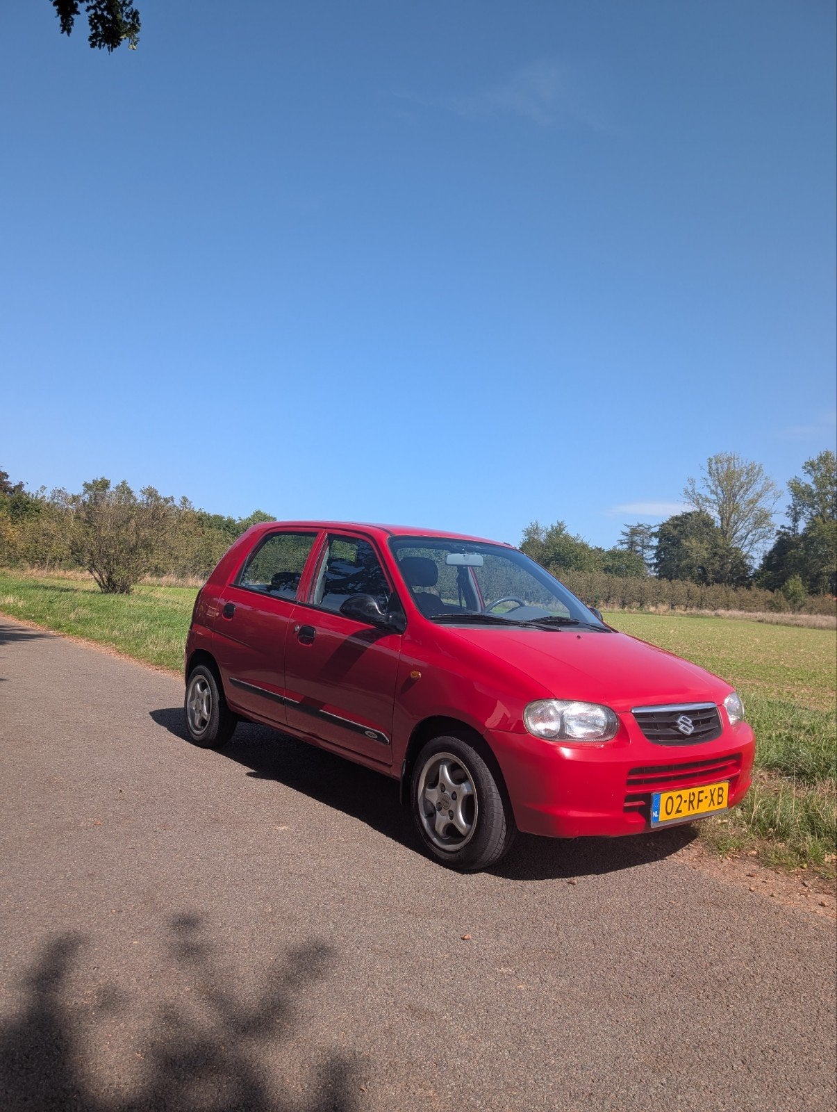 Suzuki Alto 1.1 5d 2005 Rood APK augustus '27 km:98.456, Auto's, Suzuki, Voorwielaandrijving, 750 kg, 4 cilinders, 4 stoelen