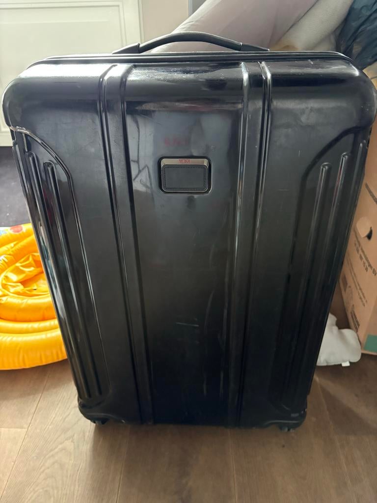 TUMI Zwarte Koffer met Wieltjes en Uitschuifbare Handgreep, Ophalen of Verzenden, Gebruikt, Zwart