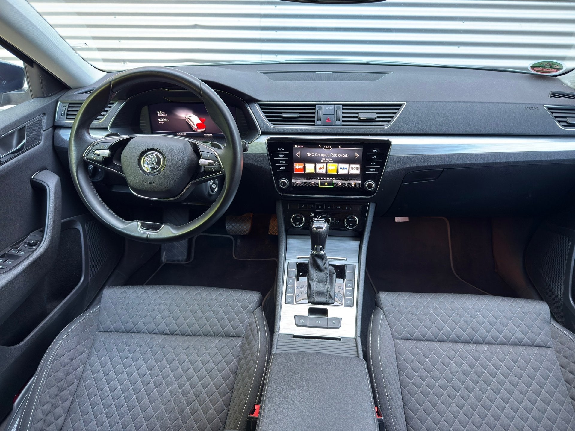 Skoda Superb Combi 1.4 TSI iV Business Edition Plus Plug In, Stof, Gebruikt, Blauw, Hybride Elektrisch/Benzine