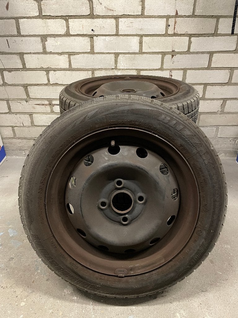 Winterbanden Bridgestone Blizzak 155/65 R14 op stalen velgen, Ophalen, 14 inch, Gebruikt, 155 mm