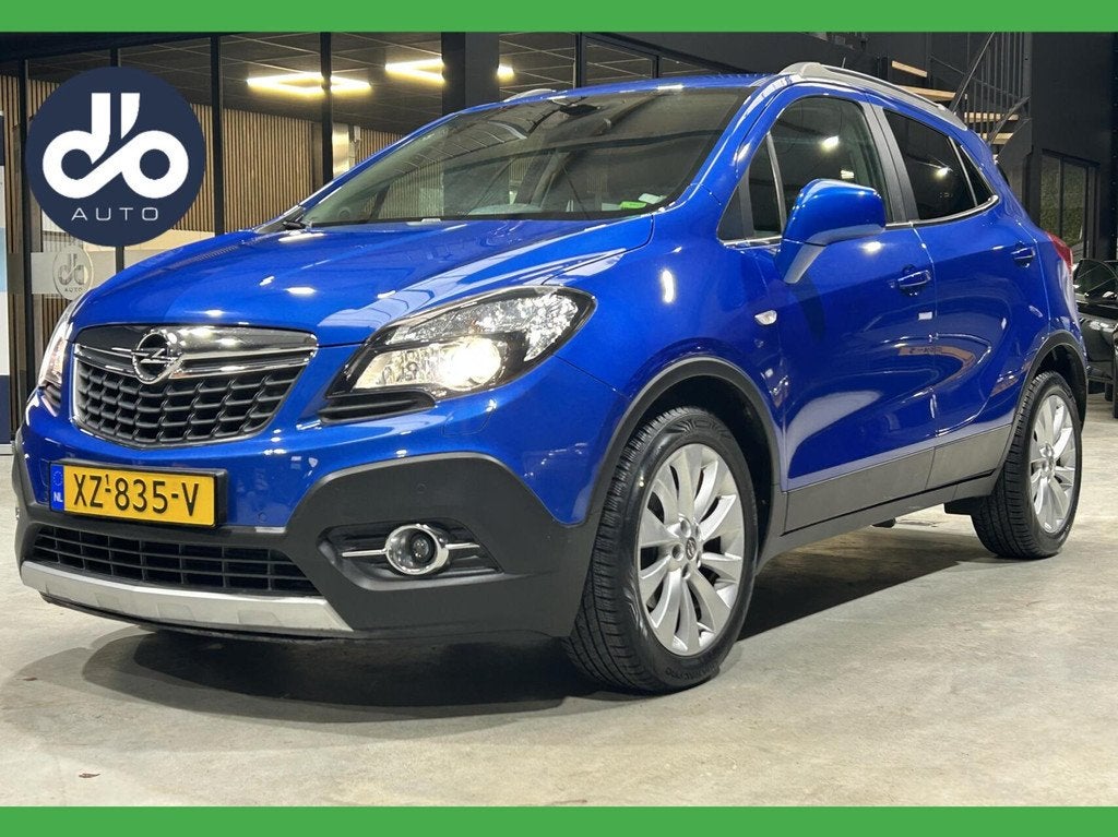 Opel Mokka 1.4 T Cosmo, Gebruikt, 4 cilinders, Blauw, Leder en Stof