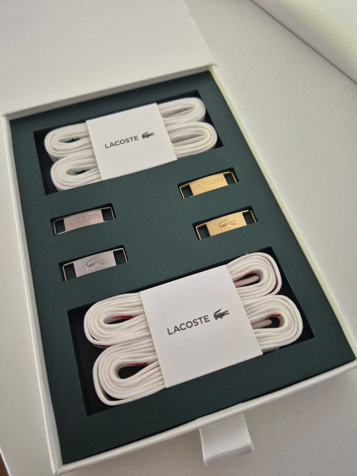 Nieuwe Lacoste veters en veterplaatjes, Ophalen of Verzenden, Nieuw, Lacoste